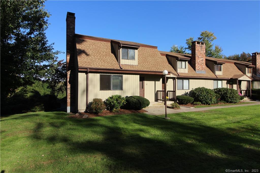 3 Sherman Lane, Unit 3 Hamden, CT 06514 - Photo 1 of 1 a view of a front of a house with a yard