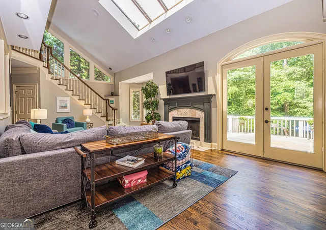 a bedroom with furniture and a fireplace