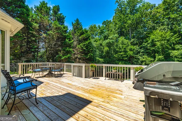 a view of a room that has a bed and a window