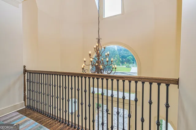 a white bath tub sitting in a bathroom next to a window