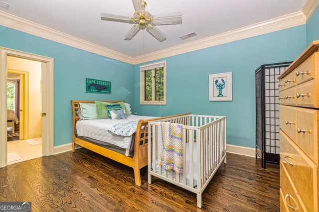 a living room with furniture a piano and a bookshelf