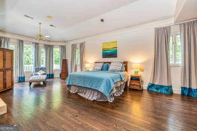 a living room with furniture rug and window