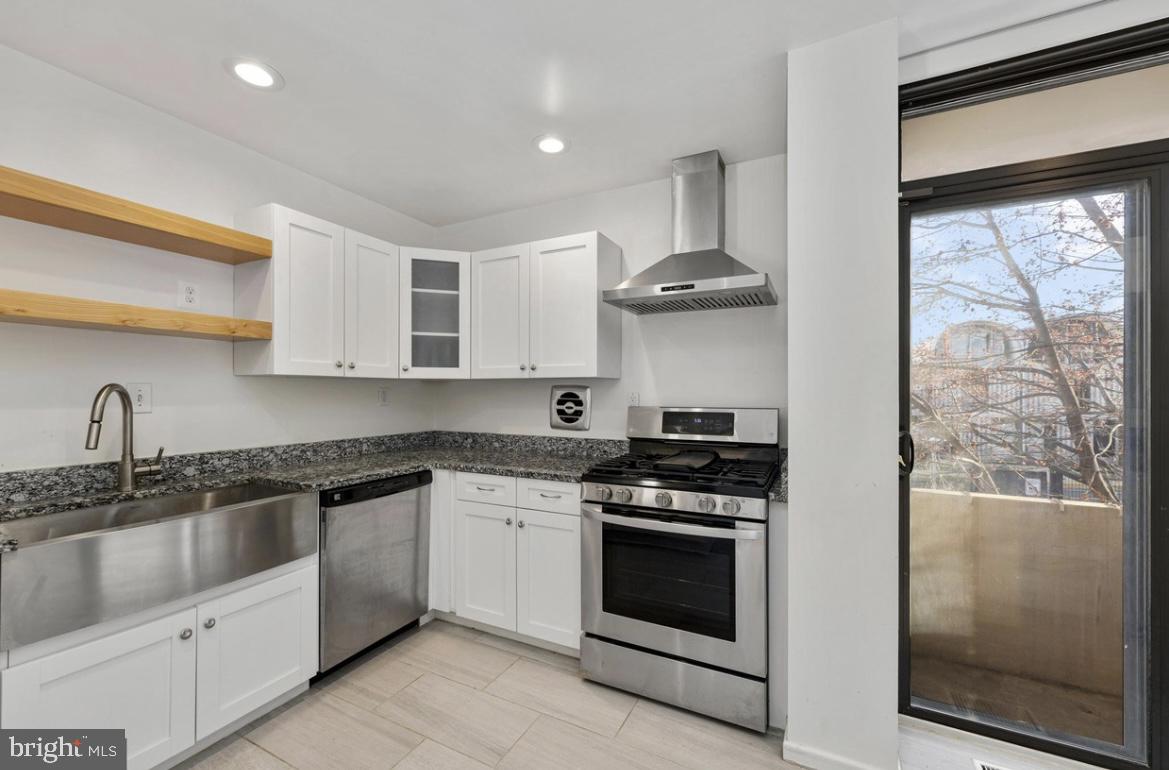 387 N Street Southwest Washington, DC 20024 - Photo 13 of 22 Modern kitchen with sleek finishes.