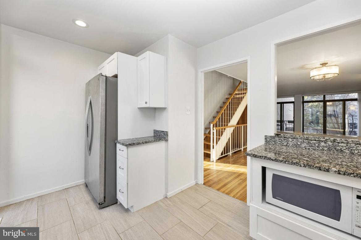 387 N Street Southwest Washington, DC 20024 - Photo 14 of 22 Modern kitchen with sleek finishes.