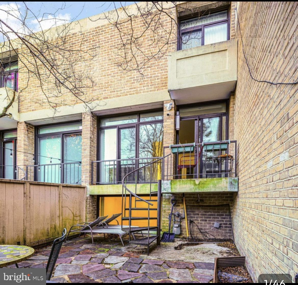 387 N Street Southwest Washington, DC 20024 - Photo 2 of 22 Charming patio with modern appeal.