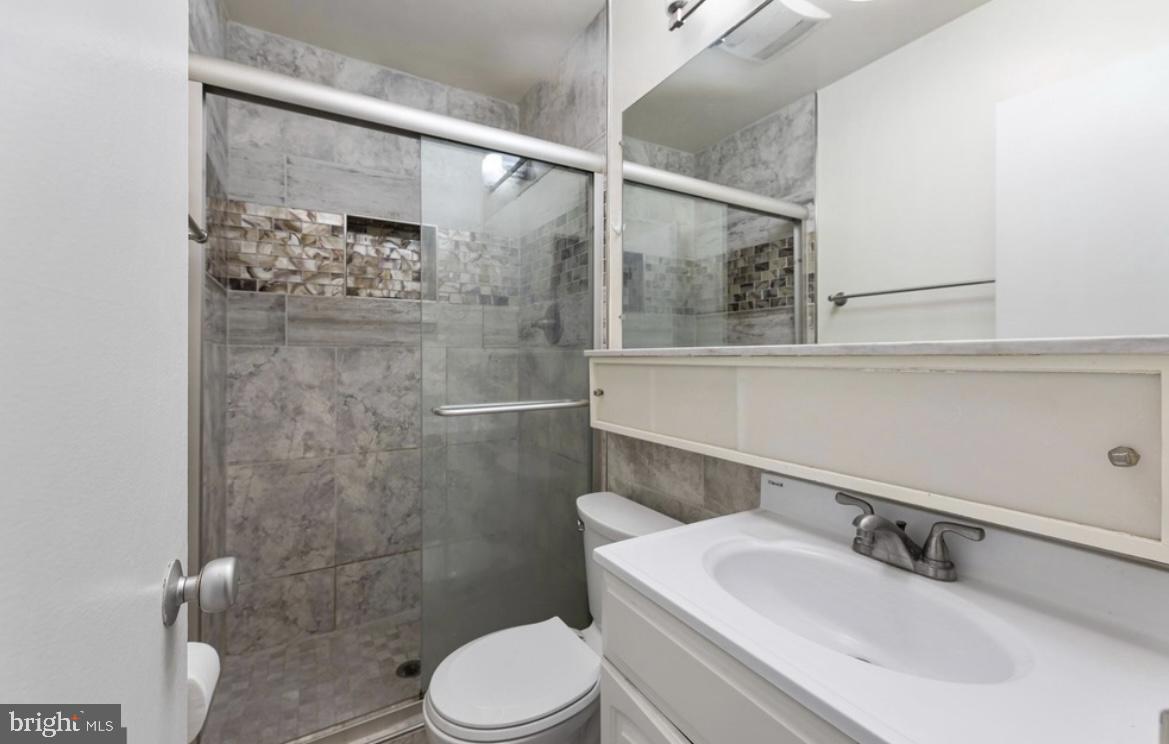 387 N Street Southwest Washington, DC 20024 - Photo 22 of 22 Modern bathroom with sleek finishes.