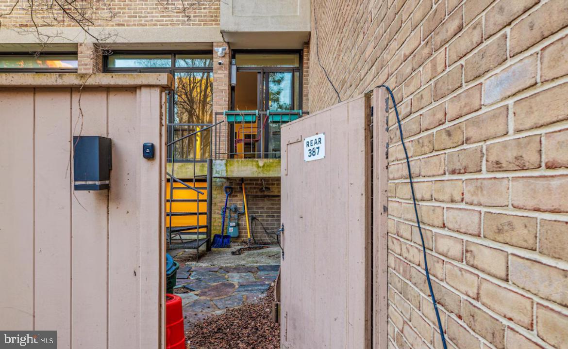 387 N Street Southwest Washington, DC 20024 - Photo 3 of 22 Charming entry to a cozy retreat.