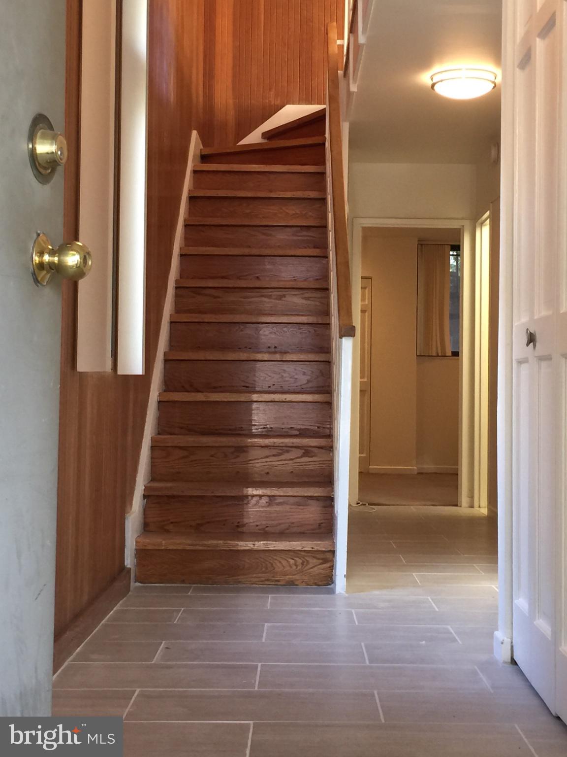 387 N Street Southwest Washington, DC 20024 - Photo 6 of 22 Inviting entryway with warm wood tones.