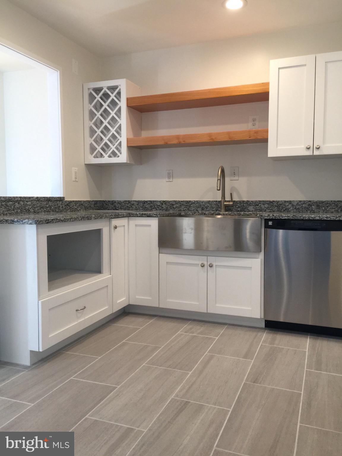 387 N Street Southwest Washington, DC 20024 - Photo 8 of 22 Modern kitchen with sleek finishes.