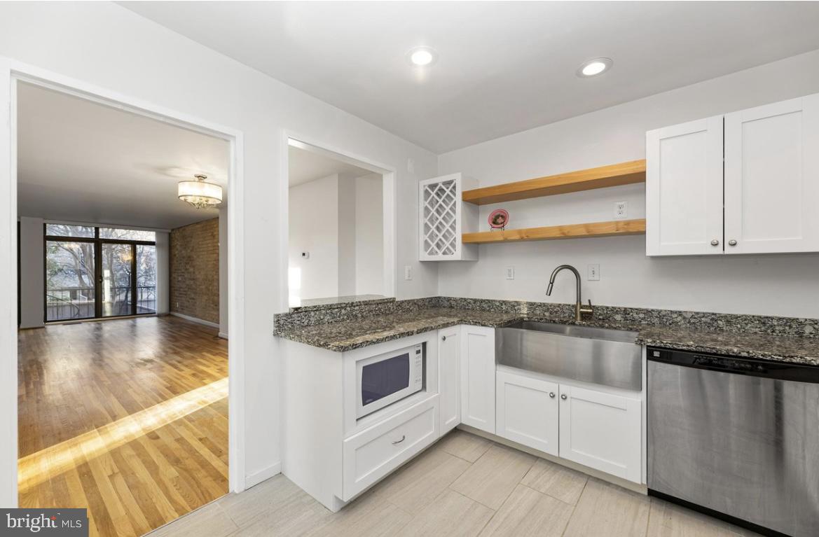 387 N Street Southwest Washington, DC 20024 - Photo 9 of 22 Modern kitchen with sleek finishes.