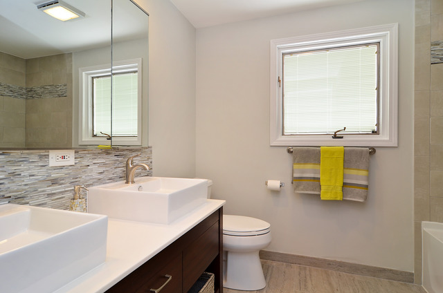 1141 Hibbard Road Wilmette, IL 60091 - Photo 6 of 20 a bathroom with a sink and a toilet