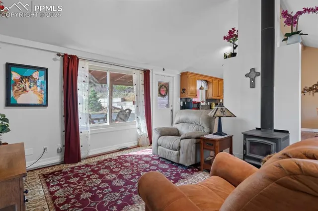 a living room with furniture or couch and a window