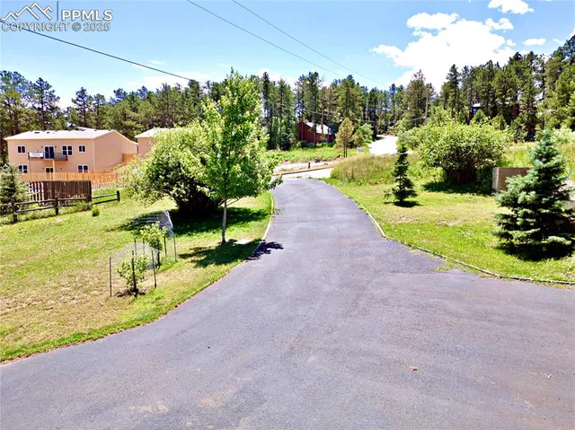 a view of a street with houses