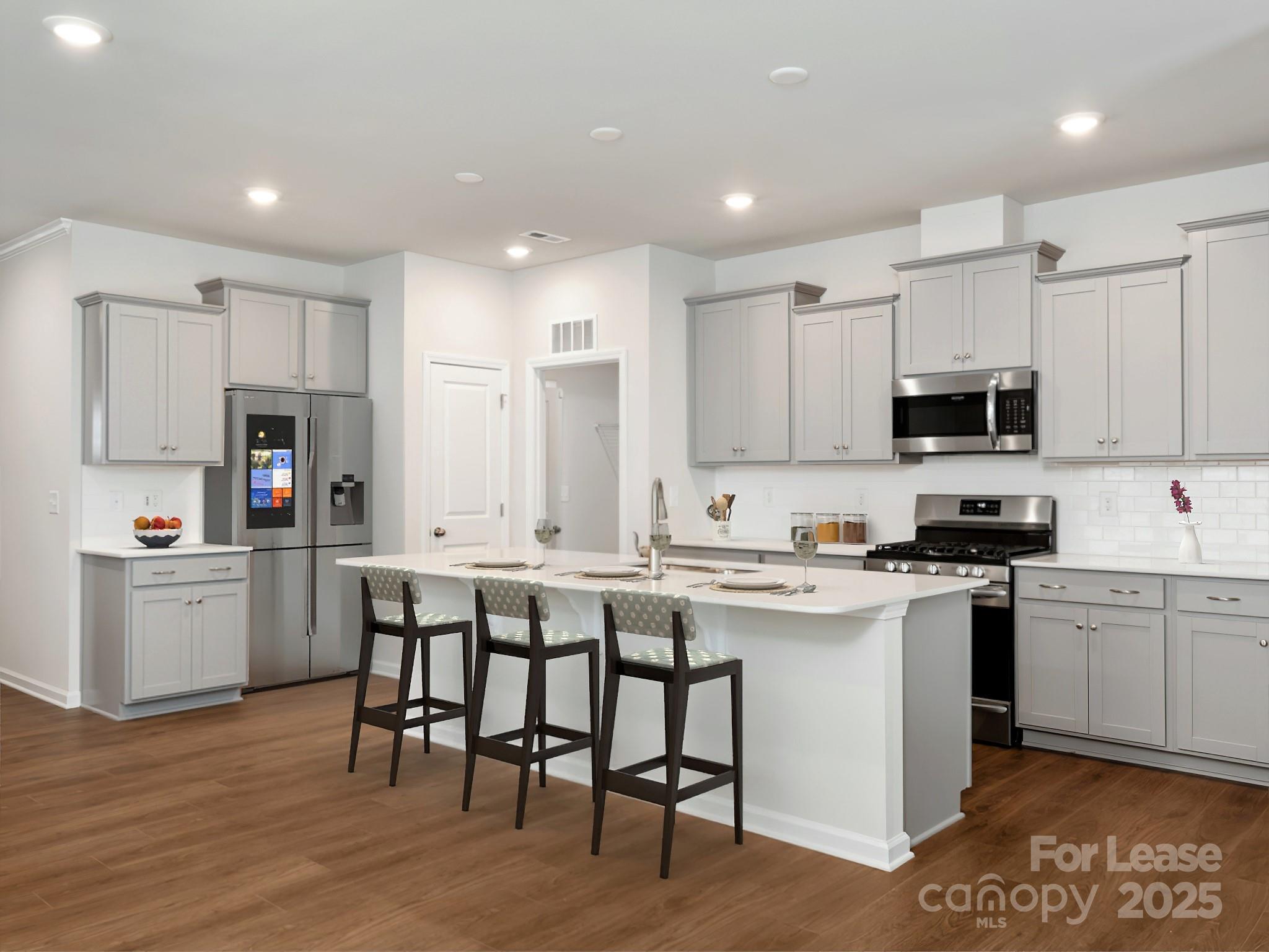 6531 Gopher Road Lancaster, SC 29720 - Photo 6 of 12 a kitchen with appliances cabinets and a sink