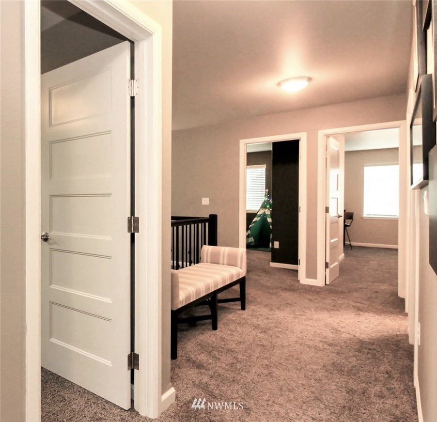 4716 Rosa Court Lacey, WA 98503 - Photo 14 of 25 a room with a bed and a view of en suite bathroom