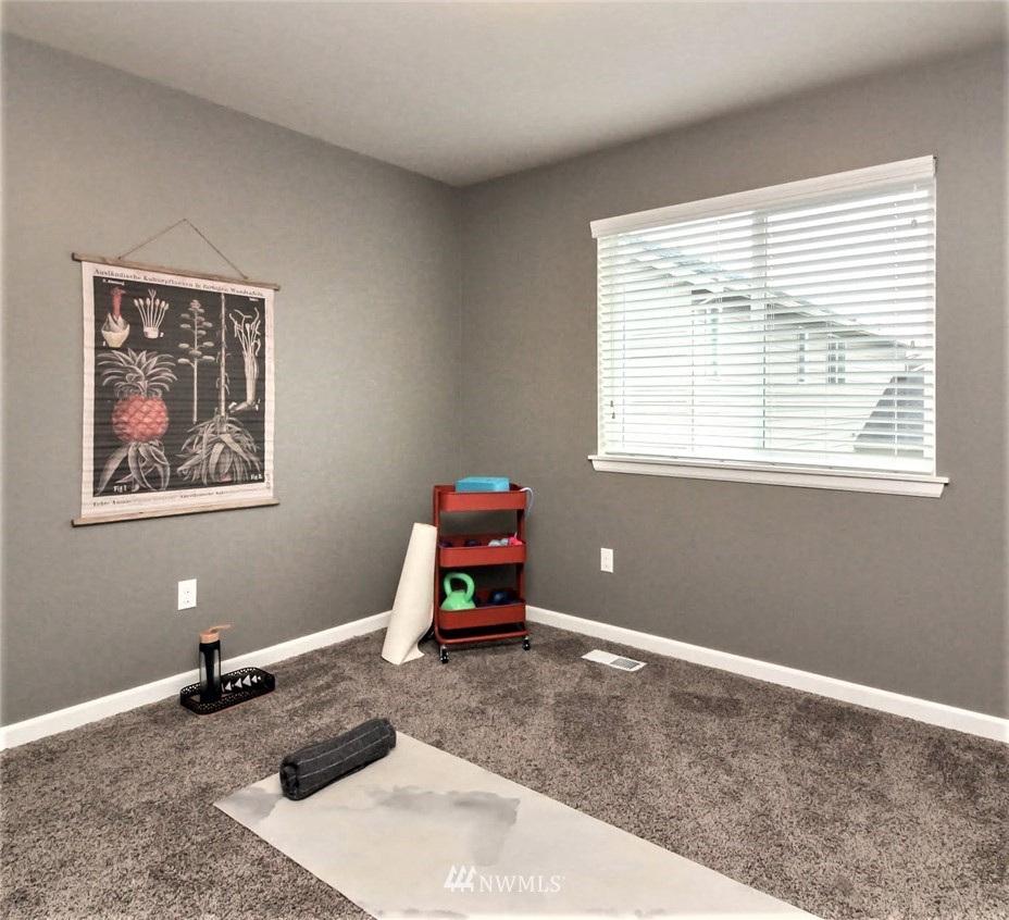 4716 Rosa Court Lacey, WA 98503 - Photo 8 of 25 a living room with furniture and a window