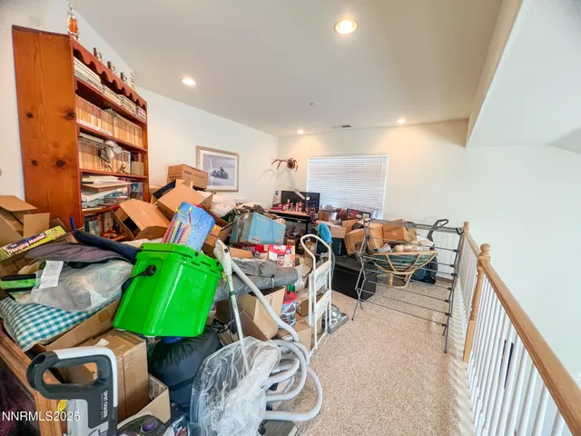 a view of a chairs and table in a patio