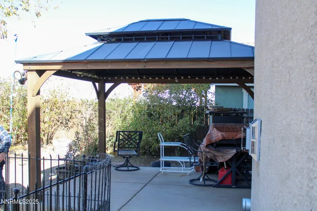 a view of sitting area in front of a house