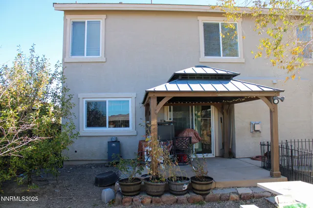 a front view of a house with patio