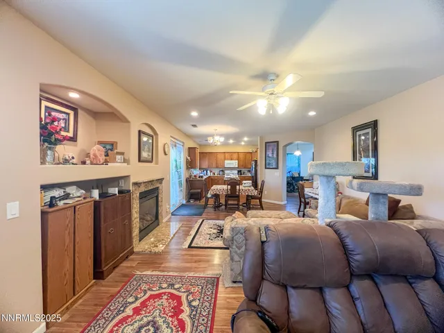 a bed room with two bed and a chandelier