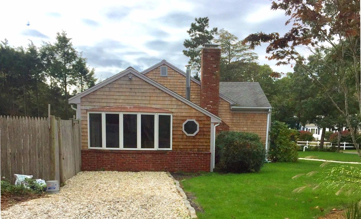36 General Lawrence Road South Yarmouth, MA 02664 - Photo 13 of 14 a view of backyard of house with green space
