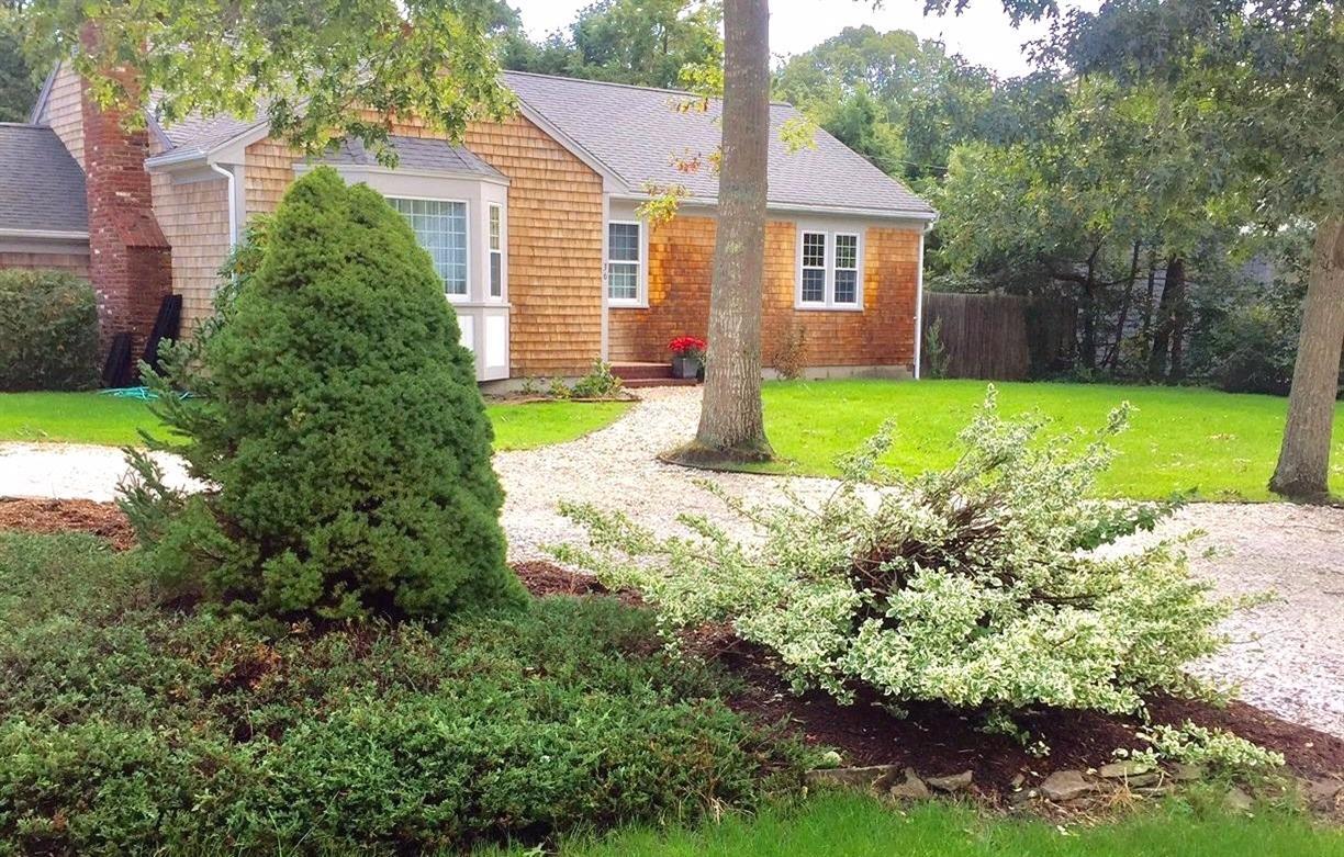36 General Lawrence Road South Yarmouth, MA 02664 - Photo 2 of 14 a house with a yard