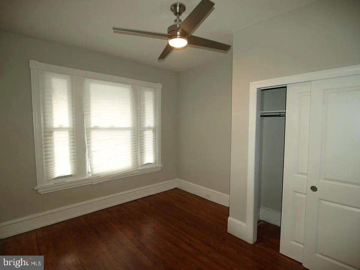 4335 Fleming Street Philadelphia, PA 19128 - Photo 9 of 19 a view of empty room with wooden floor and fan
