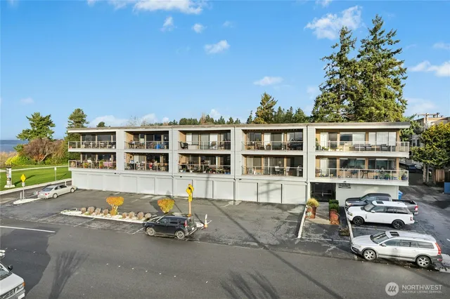 a view of multiple houses with outdoor space