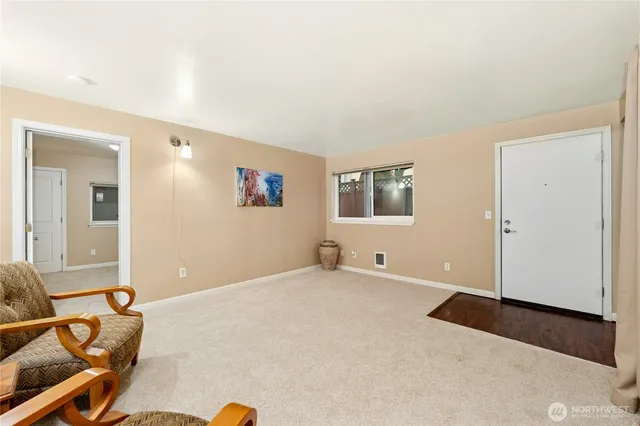 a view of a livingroom with furniture and wooden floor