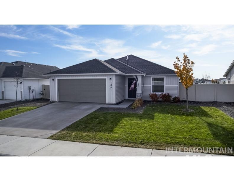 12771 Carkhill Street Caldwell, ID 83607 - Photo 1 of 13 Ranch-style exterior with light-toned siding and dark roof