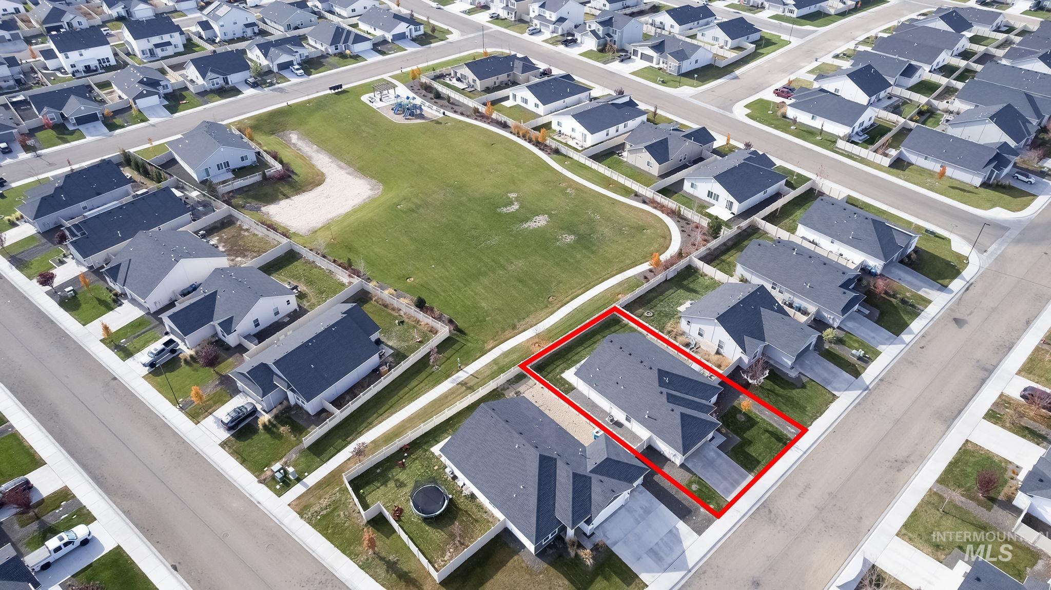 12771 Carkhill Street Caldwell, ID 83607 - Photo 2 of 13 Aerial depiction of a single-story residence featuring a dark shingle roof and light-colored siding
