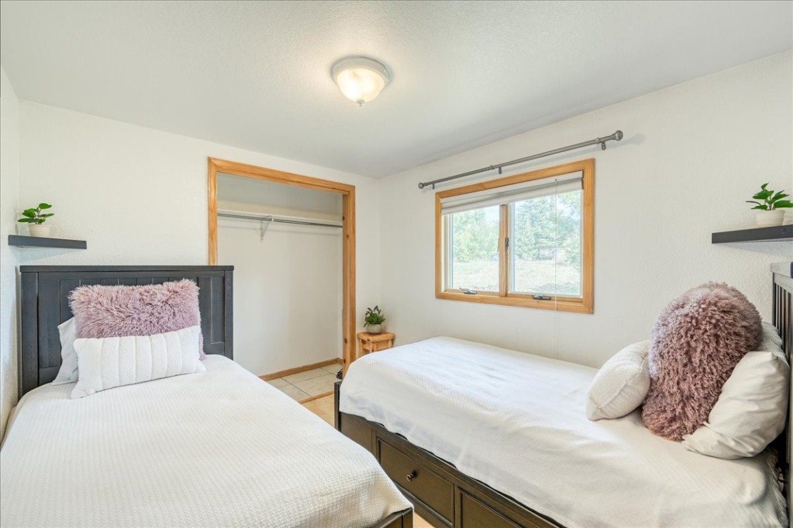 38 D Road Silverthorne, CO 80498 - Photo 24 of 34 a bedroom with a bed and a window