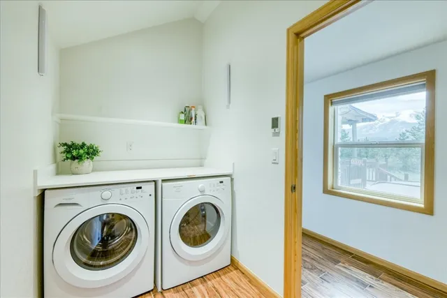 a utility room with dryer and washer