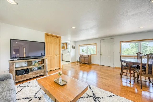 a living room with furniture and a table