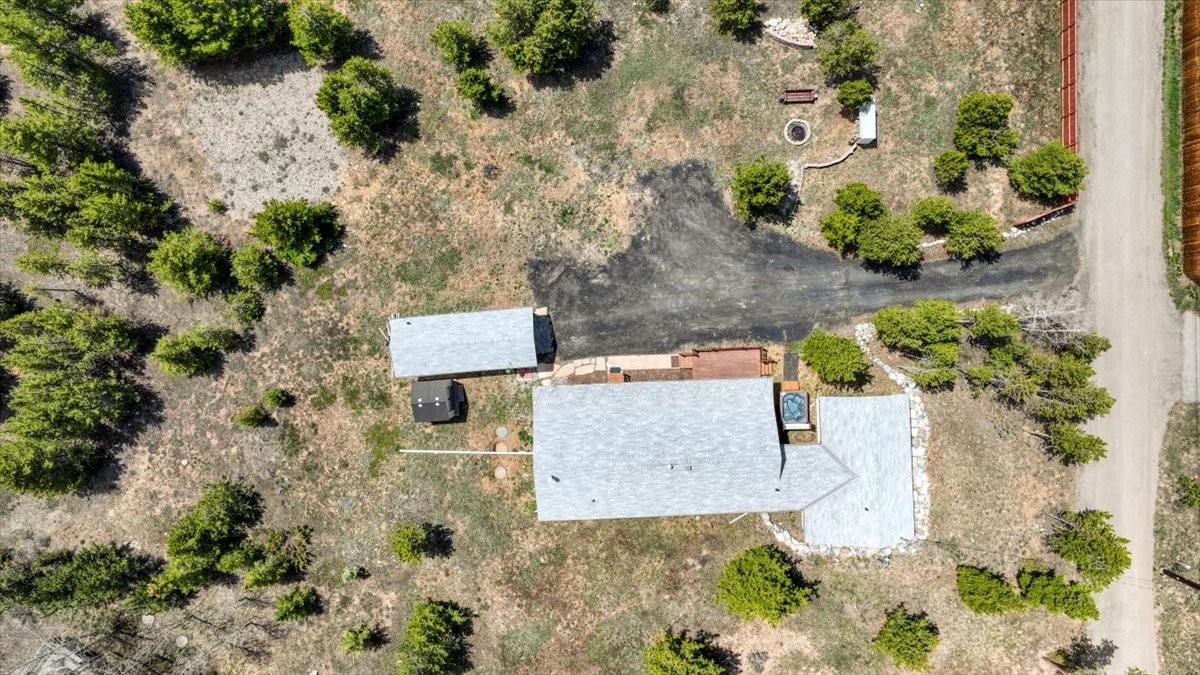 38 D Road Silverthorne, CO 80498 - Photo 34 of 34 an aerial view of a house with a yard and a tree