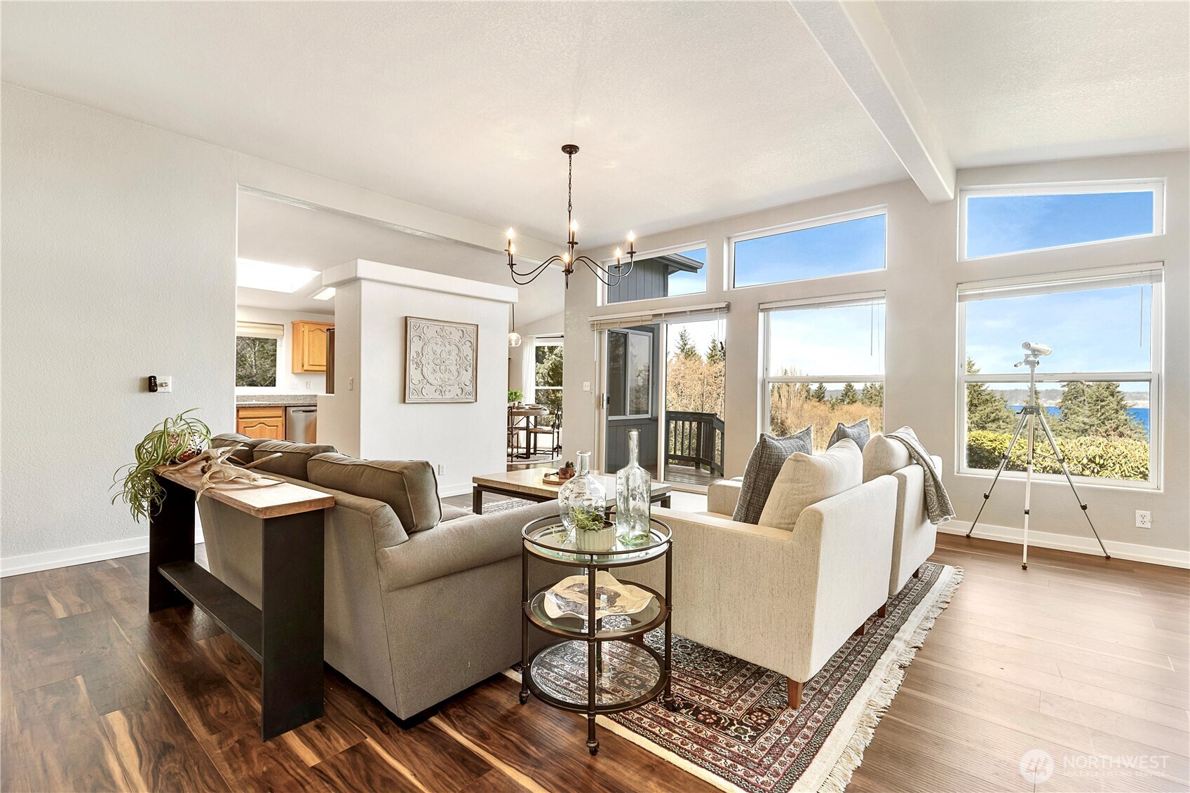 3834 South Passage View Lane Langley, WA 98260 - Photo 15 of 40 a living room with furniture large window and wooden floor