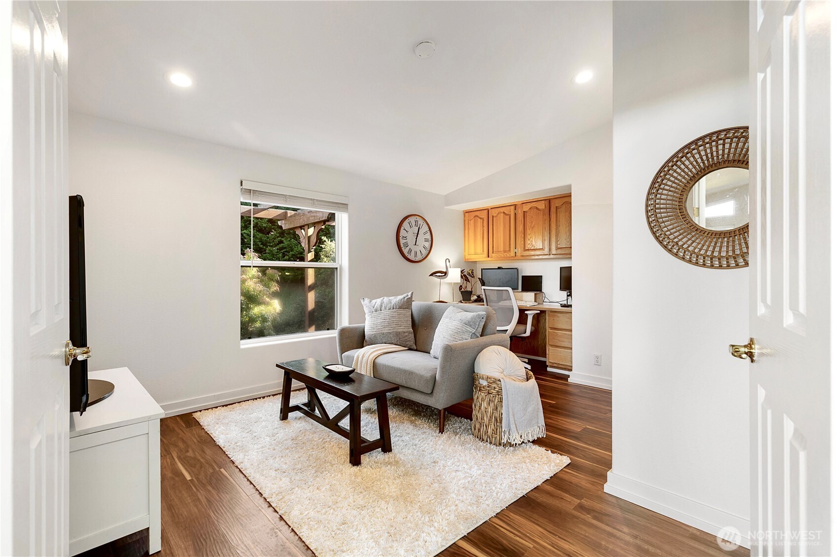 3834 South Passage View Lane Langley, WA 98260 - Photo 30 of 40 a living room with furniture and a window