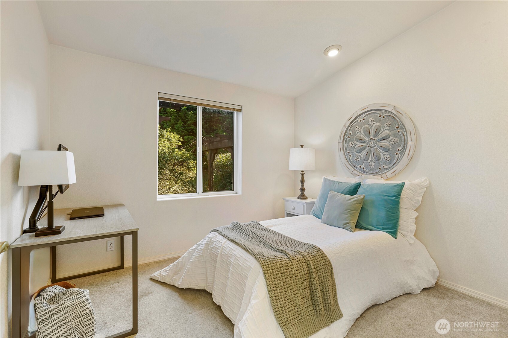 3834 South Passage View Lane Langley, WA 98260 - Photo 31 of 40 a bedroom with a bed a window and wall painting