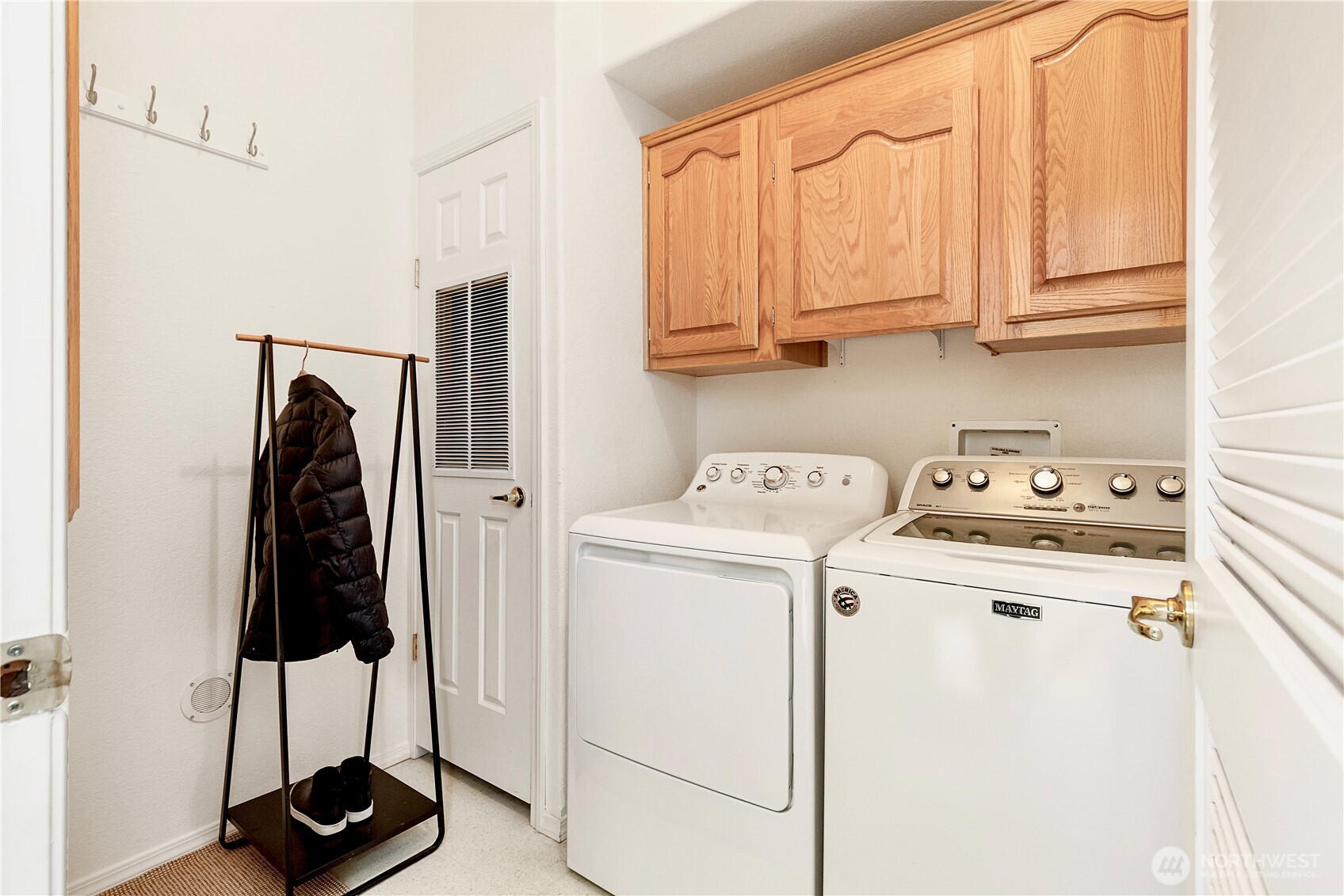 3834 South Passage View Lane Langley, WA 98260 - Photo 34 of 40 a view of a storage and utility room with washer and dryer