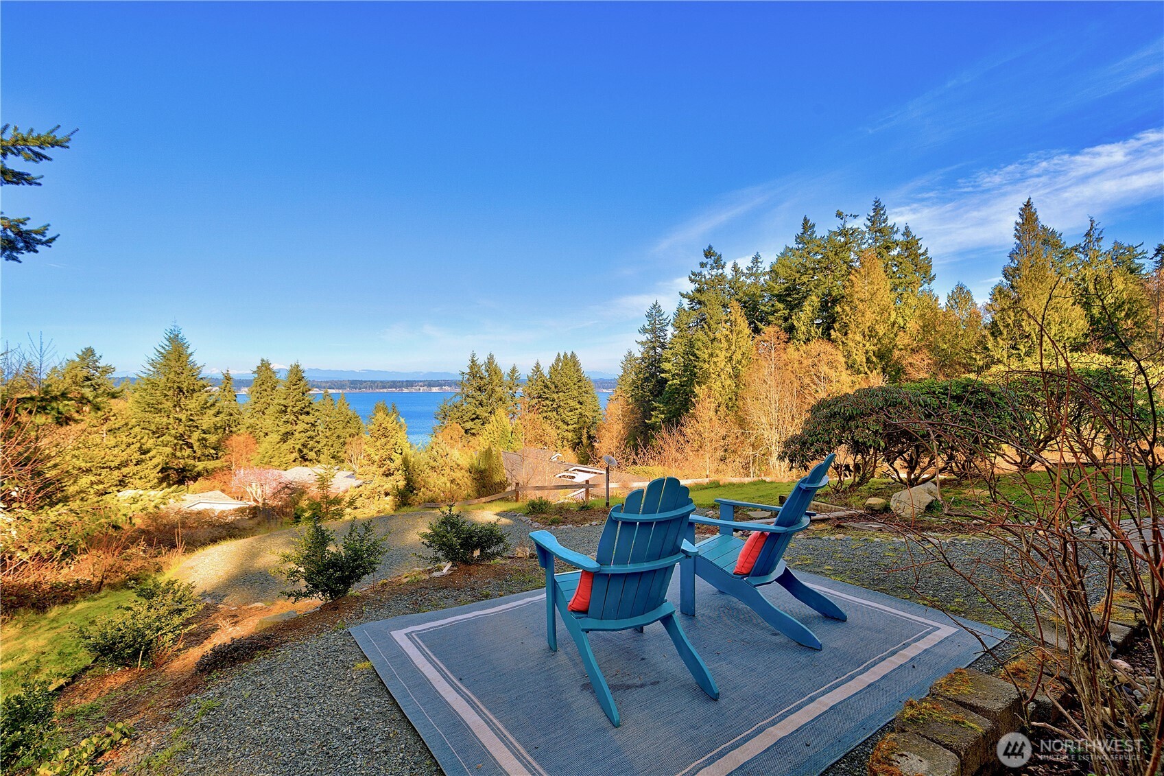 3834 South Passage View Lane Langley, WA 98260 - Photo 37 of 40 a sitting area with swimming pool and outdoor seating