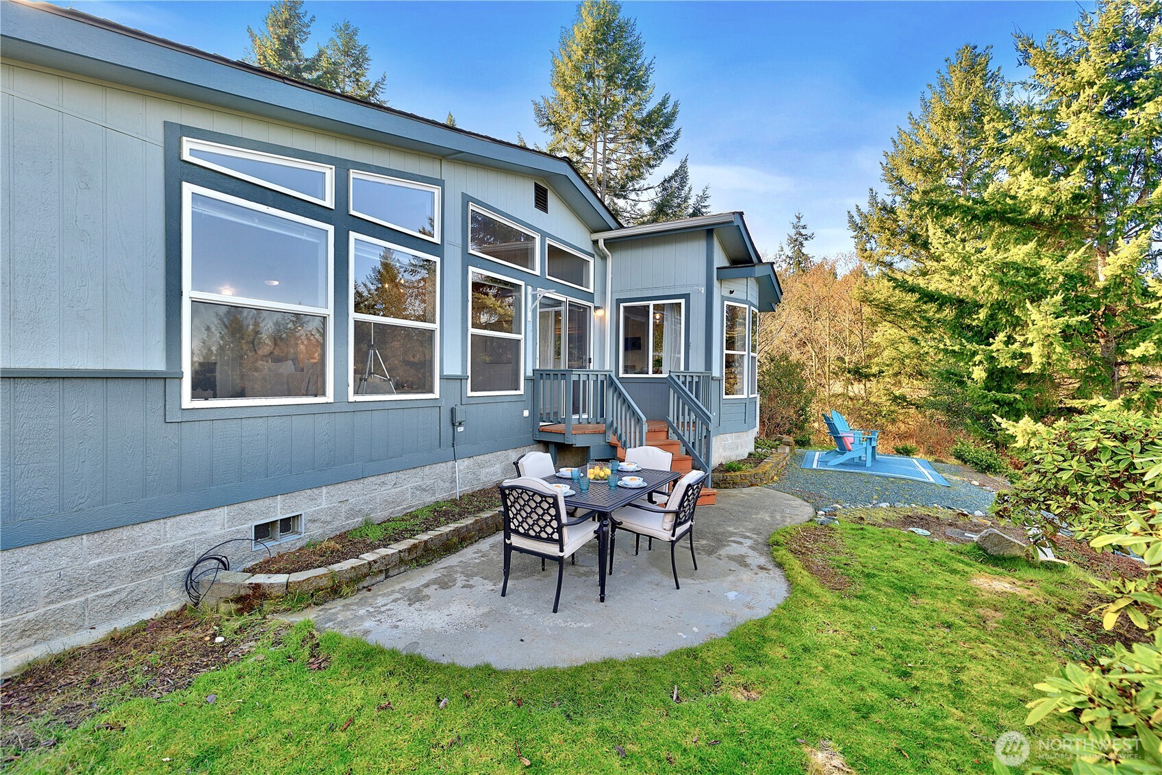 3834 South Passage View Lane Langley, WA 98260 - Photo 39 of 40 a view of a house with backyard and sitting area