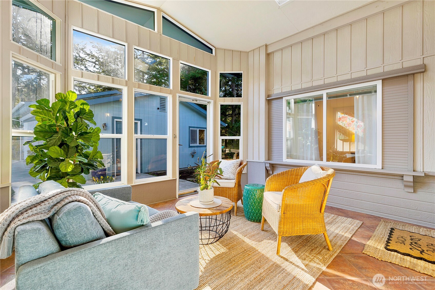 3834 South Passage View Lane Langley, WA 98260 - Photo 7 of 40 a outdoor living space with patio furniture and garden view