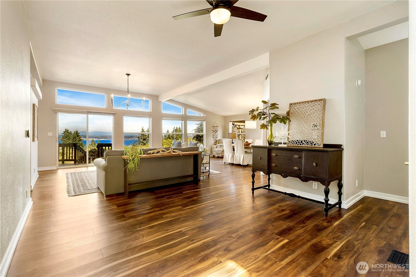 3834 South Passage View Lane Langley, WA 98260 - Photo 9 of 40 a living room with furniture and a large window