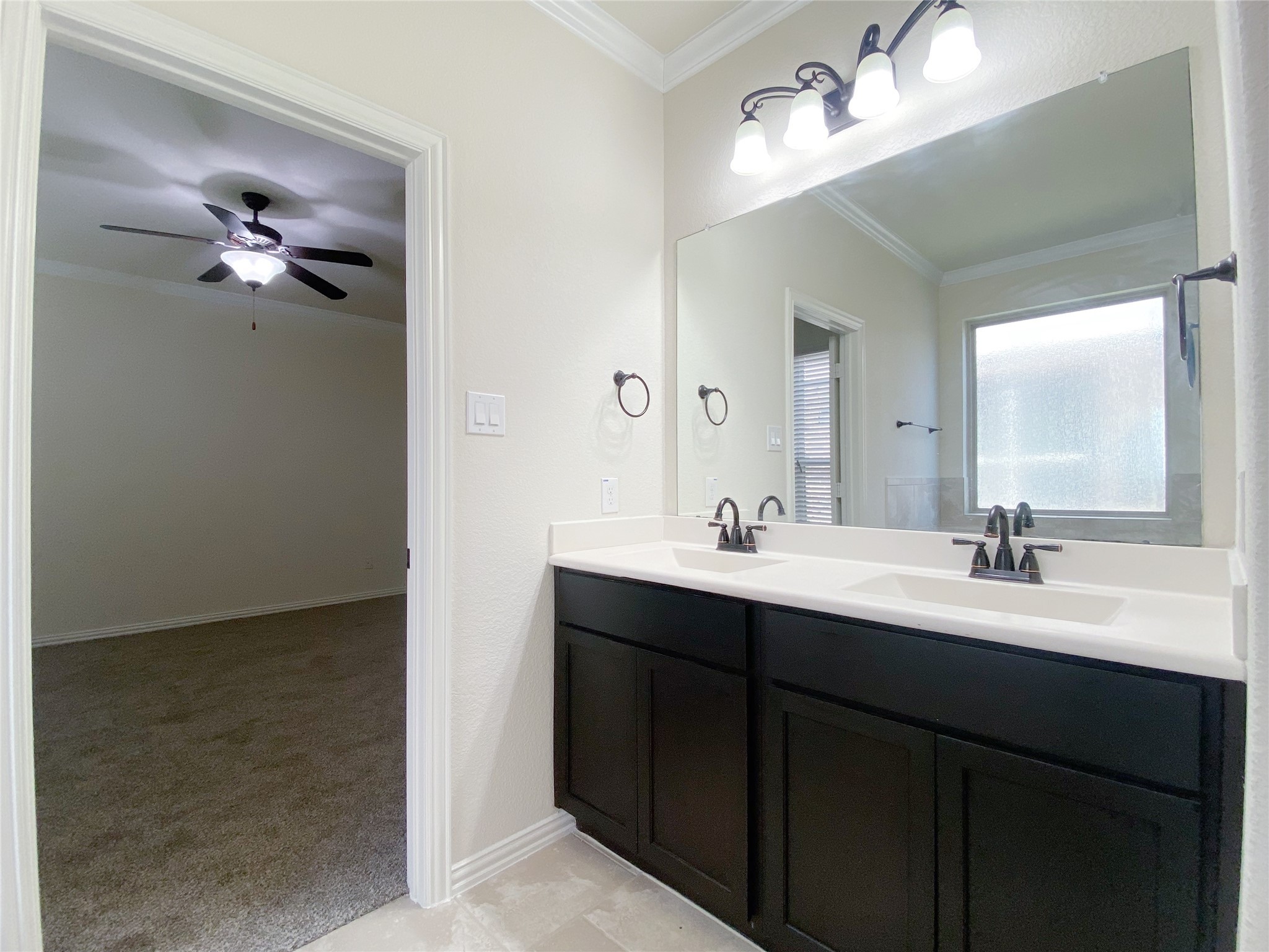 3566 Hamilton Bend Lane Spring, TX 77386 - Photo 15 of 25 a bathroom with a double vanity sink and a mirror
