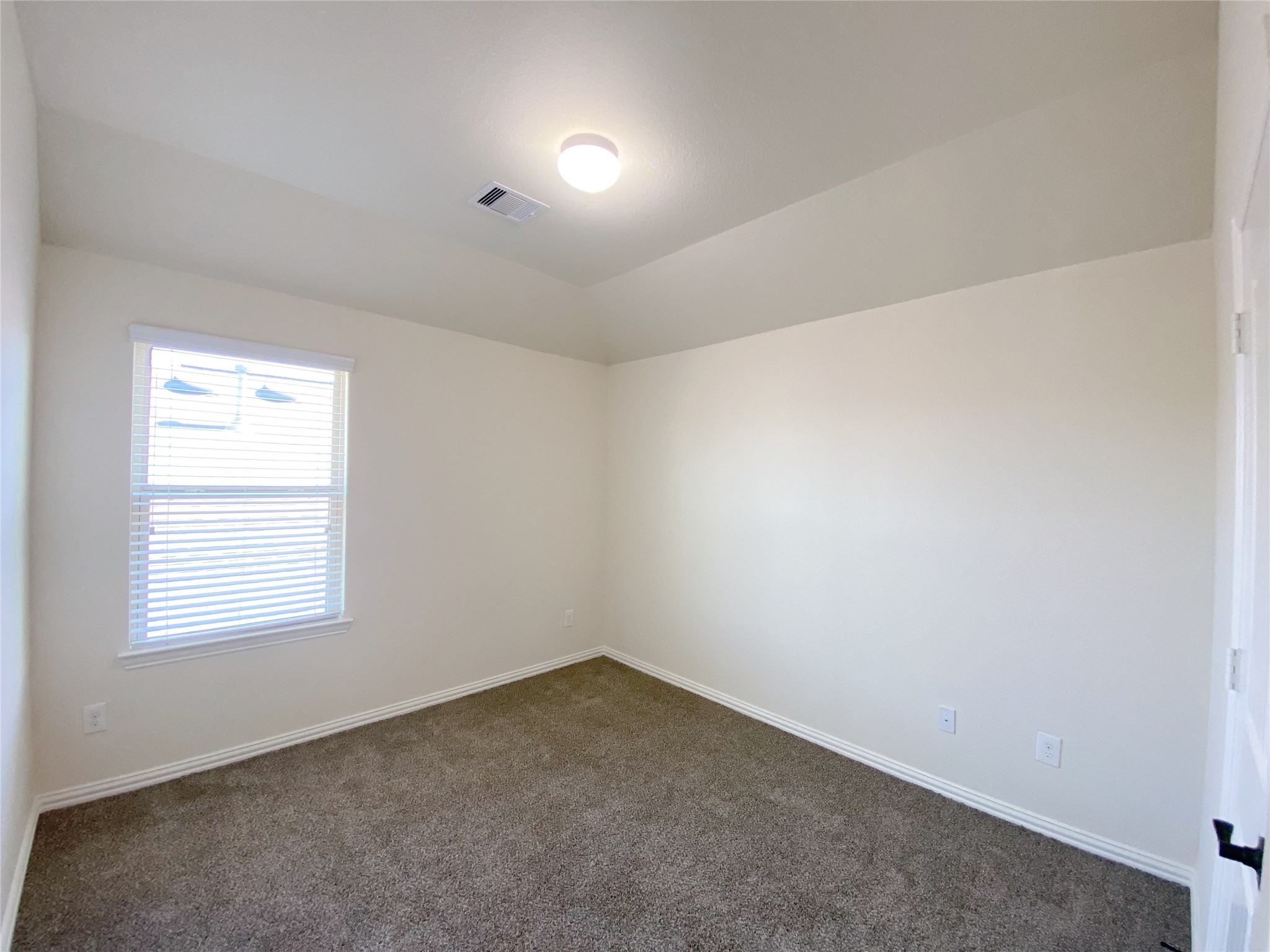 3566 Hamilton Bend Lane Spring, TX 77386 - Photo 23 of 25 an empty room with a window