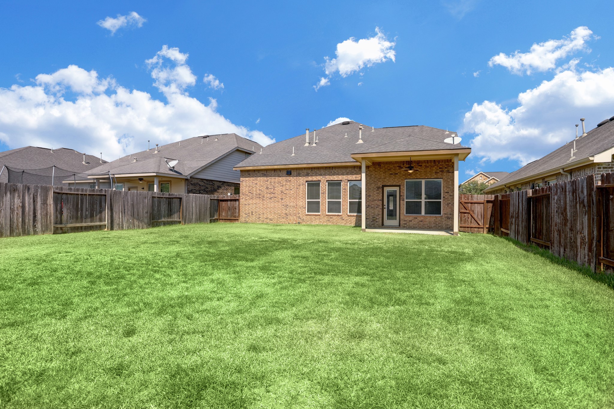 3566 Hamilton Bend Lane Spring, TX 77386 - Photo 25 of 25 a view of a house with a back yard
