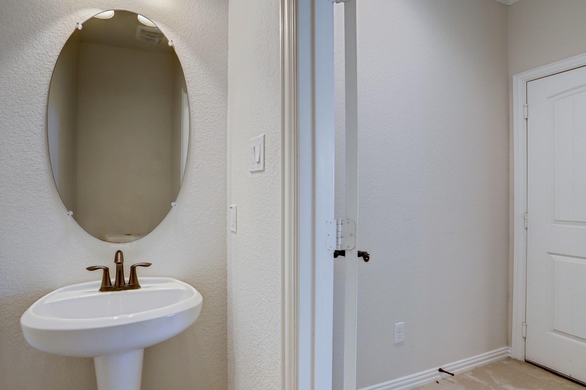 3566 Hamilton Bend Lane Spring, TX 77386 - Photo 7 of 25 a bathroom with a sink and a mirror