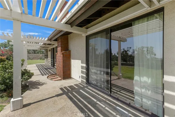 a view of porch with yard