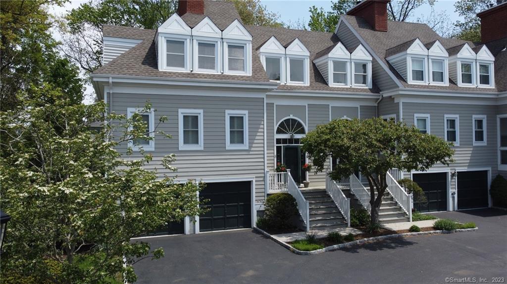 450 Center Street, Unit 8 Fairfield, CT 06890 - Photo 1 of 1 a view of a house with a yard