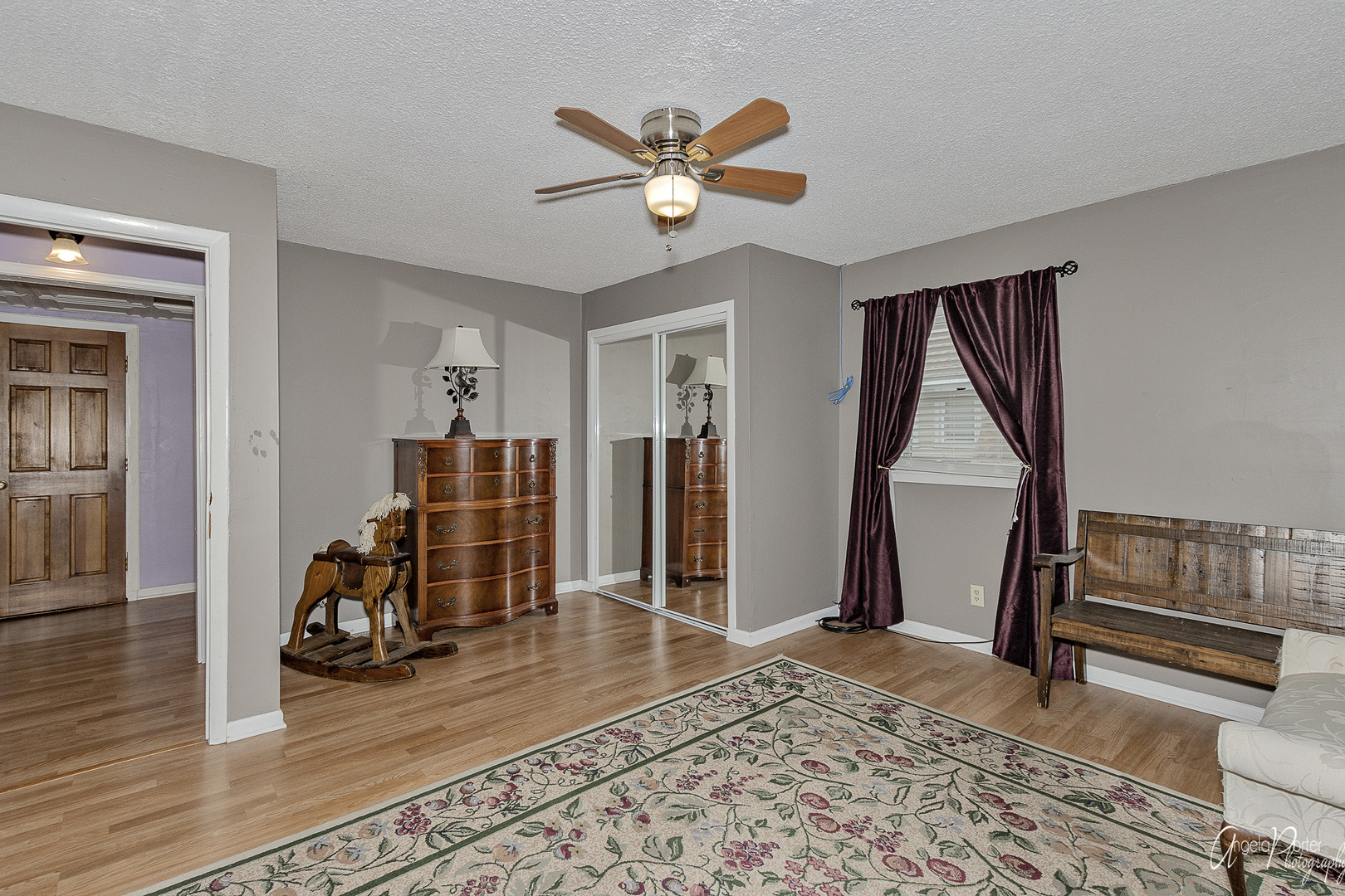 26316 West Rollins Road Ingleside, IL 60041 - Photo 23 of 45 a view of a livingroom with furniture and a ceiling fan
